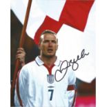 Football David Beckham 10x8 signed colour photo pictured while captaining England. Good Condition.