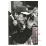 John Badham signed 10x8 black and white photo. American director of film and television, best