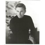 Kirk Douglas signed 10x8 black and white photo. Young image. Signed on dark part of photo. Slight