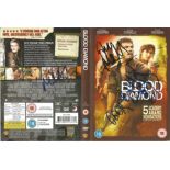 Blood Diamond DVD sleeve signed by cast members Martin Sheen, Jimi Mistry and Arnold Vosloo. Blood