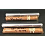 President Bill Clinton signed two commemorative cigars both housed in metal cigar cases. Good