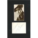 Rory Calhoun signature piece mounted below vintage photo. Approx overall size 12x7. Good