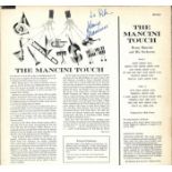 Henry Mancini signed 33rpm record sleeve of The Mancini Touch. April 16, 1924 – June 14, 1994) was