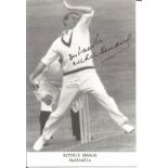 Ritchie Benaud Signed Australia Cricket Promo Photo. Good Condition. All autographs are genuine hand