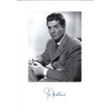 Victor Mature signature piece mounted below b/w photo. Approx overall size 15x11. Good Condition.