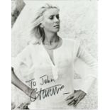 Catherine Deneuve signed 10x8 black and white photo. French actress as well as an occasional singer,