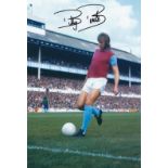 Football Autographed Billy Bonds Photo, A Superb Image Depicting The West Ham Centre-Half Striking A