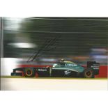 Heikki Kovalainen signed 12x8 colour photo racing for Lotus. Good condition Est.