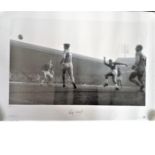Football Roger Hunt 16x23 signed black and white photo picturing the Liverpool legend shooting