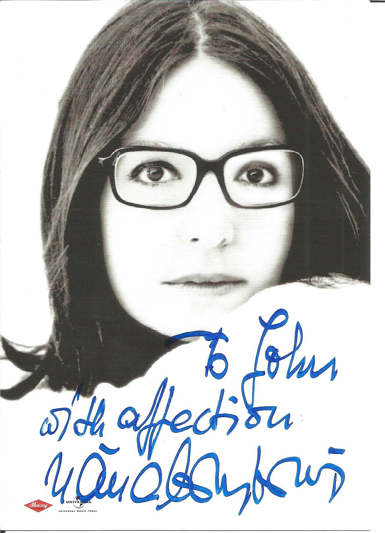 Nana Mouskouri signed 6x4 black and white postcard photo. Greek singer. During the span of her music