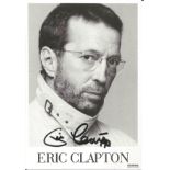 Eric Clapton signed 6x4 black and white photo. English rock and blues guitarist, singer, and