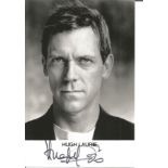 Hugh Laurie signed 6x4 black and white photo. Good condition Est.