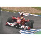 Felipe Massa signed 12x8 colour photo racing for Ferrari. Good condition Est.