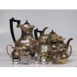A silver topped glass inkwell circa 1900, a small three piece silver cruet and a plated tea and