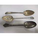 A pair of Irish silver table spoons with later decoration and a silver 'dog nose' spoon, possibly by