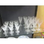 A part suite of Waterford crystal glassware to include ten trumpet shape wine glasses and nine
