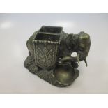 An early 20th century Austrian brass match holder in the form of a circus elephant