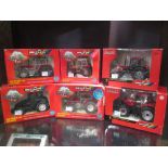 Britains; A 9501 Massey Ferguson 3680, boxed, A 42303 Case 1H 210 Puma Tractor, boxed, A 42793