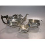 A matched Chester silver three piece tea set, 30oz