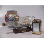 Epee brass case carriage timepiece, Poole (Carter Stabler Adams) pottery vase, and two ships in