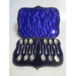 A cased set of 12 Victorian silver apostle spoons and sugar tongs by John Round & Son, Sheffield