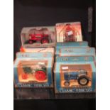 ERTL; Three 5607 John Deere overtime, boxed, Two 802 Fordson super major, boxed, A 2622 case "G"