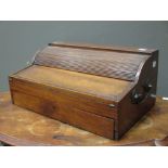 A mahogany tambour top writing box