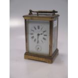 A repeating carriage clock with alarm, gong striking