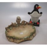 A Carlton Ware penguin lamp base, probably for Guinness & a Royal Dux dish mounted with an owl