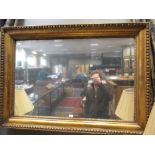A gilt framed wall mirror 118 x 84cm