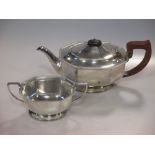 An Edwardian silver tea pot and twin handled sugar 25oz