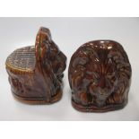 A pair of Wheilden treacle glazed Lion mask dresser feet (2)