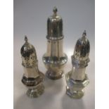 Three Edwardian silver sugar casters, 13oz