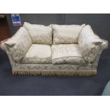 A two seater sofa in gold damask fabric with bullion fringe 200cm wide approx