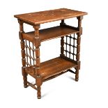 Liberty & Co., an oak etagere designed by Leonard Wyburd, the rectangular top above two lower