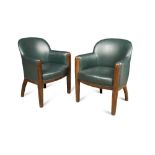 A pair of Art Deco club armchairs in the manner of Émile-Jacques Ruhlmann, with reeded tapering