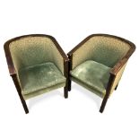A pair of Continental Art Deco lounge chairs, with stained hardwood frames and green fabric