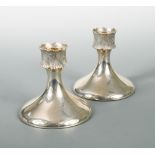 Grant Macdonald, a pair of 20th century Britannia silver candlesticks, London, 1978, of circular