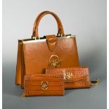 Daniella di Royale of Verona, a new and unused 'Le President' cognac leather handbag, with gilt