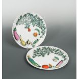 Pierro Fornasetti, 'Rutino' and 'Zucchino', a pair Vegetalia plates, printed in colours with herbs