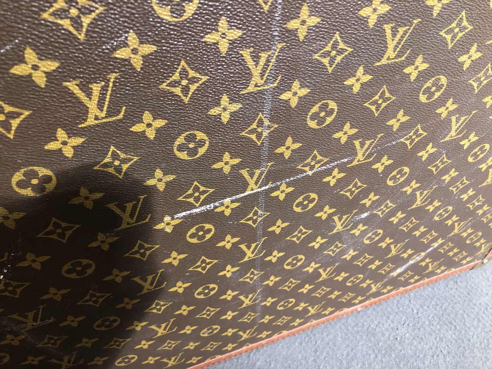 Louis Vuitton, a large monogrammed canvas and leather suitcase, late 20th century, opening to reveal - Image 3 of 11