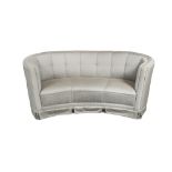A Danish Art Deco 'Banana' sofa, with pale blue/grey and pink upholstery 80 x 193cm (31 x 75in)