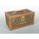 Louis Vuitton, a monogrammed canvas and leather vanity case, late 20th century, opening to reveal