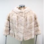 A vintage blonde mink coat, with ¾ length sleeves, labelled Deanfield, London, fully lined in a