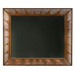 Stuart Devlin, (Australian, born 1931), an Indian rosewood filigree wall mirror, circa 1980, the