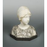 An early 20th century carved marble and alabaster bust of a young maiden, mounted to a black