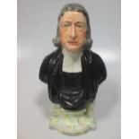 A Staffordshire portrait bust of John Wesley, after a model by Enoch Wood, the reverse moulded