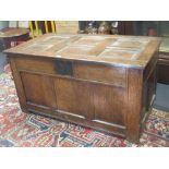 An 18th century panelled oak coffer, 58 x 109 x 59cm