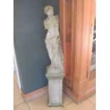 A garden statue on stand of Venus, 147cm high, and a garden pot without stand, 49cm wide