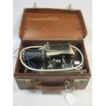 A cased Electro convulsive therapy machine by Medical Supply Association